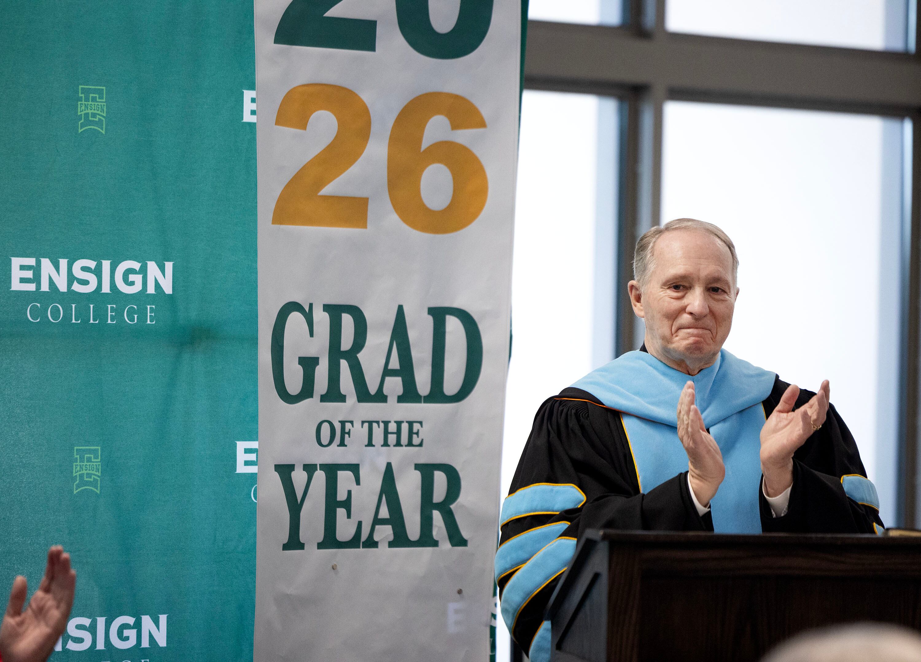 Ensign College President Bruce C. Kusch speaks to graduates of the Ensign College Prison Education Program at the Utah State Correctional Facility in Salt Lake City on Wednesday. Kusch called it an unforgettable day.