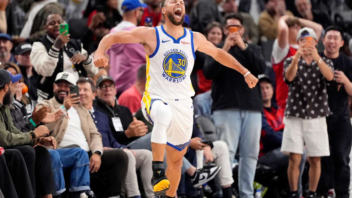 Golden State Warriors guard Stephen Curry celebrates after scoring during the second half of an NBA play-in tournament basketball game against the LA Clippers, Wednesday, April 15, 2026, in Inglewood, Calif.
