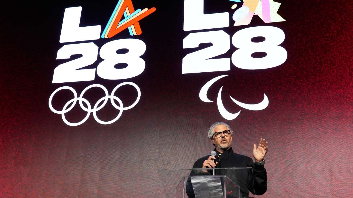 FILE - Casey Wasserman, chairman of the 2028 Los Angeles Olympics organizing committee, speaks at the launch party for Fanatics Studio, a global studio for sports entertainment, Jan. 13, 2026, at the Intuit Dome in Inglewood, Calif.