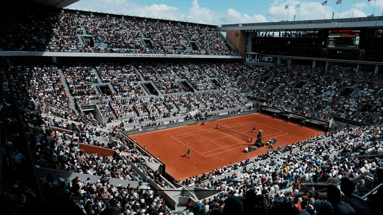 FILE - The crowd watch Norway's Casper Ruud playing against Spain's Rafael Nadal on the court Philippe Chatrier, known as center court, during their final match of the French Open tennis tournament at the Roland Garros stadium on June 5, 2022 in Paris.