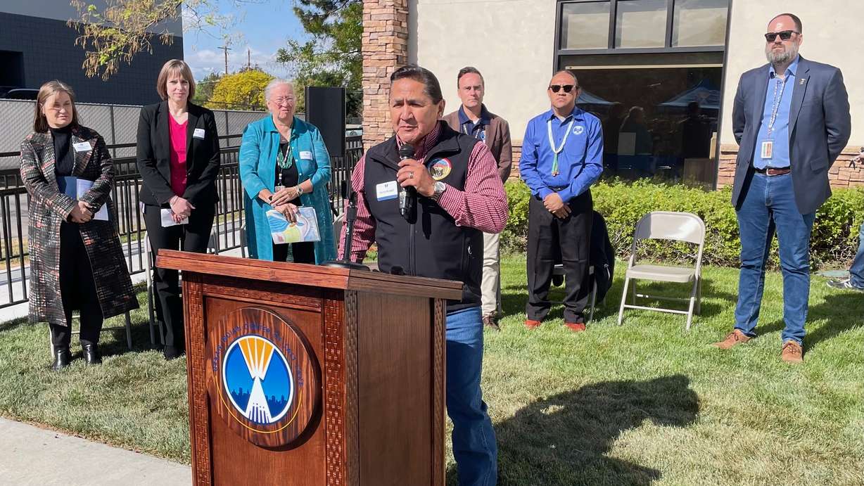 Urban Indian Center officials and the organization's backers gathered Thursday for a ceremony to unveil the expanded health care offerings at its Murray clinic. Henry Howell offers the opening prayer to the event in the photo.