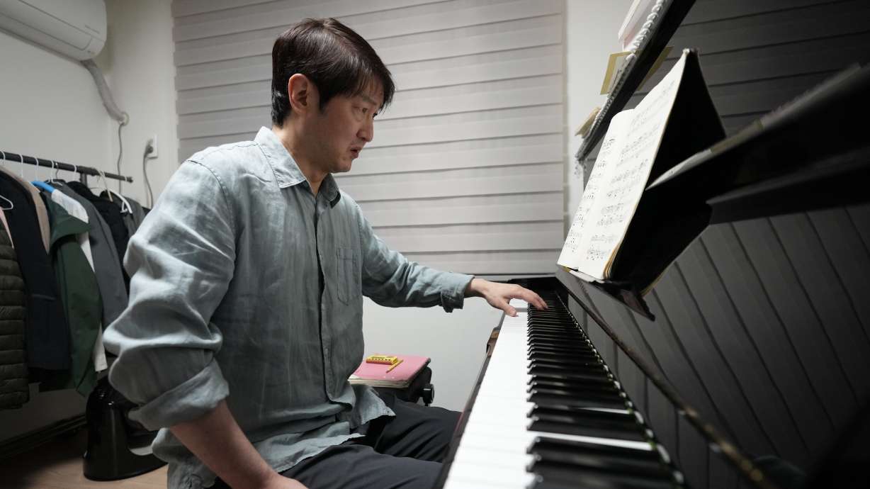 South Korean pianist Lee Hun demonstrates how to play the piano after an interview in Seoul, South Korea, April 8.