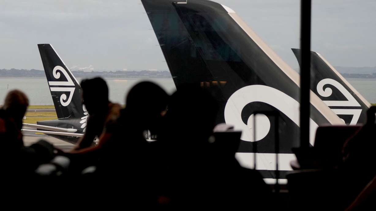 Passengers wait in the Air New Zealand lounge at Auckland International Airport in Auckland, New Zealand, March 23, 2022.