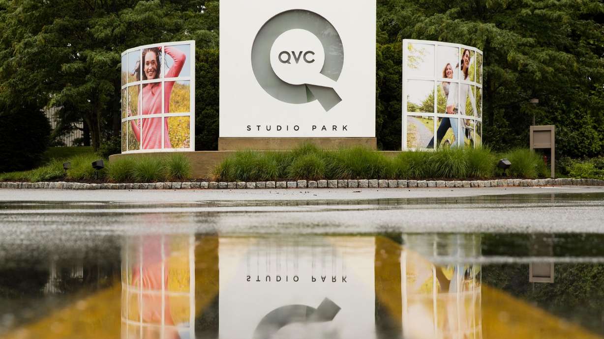 The entrance to QVC's offices are pictured in West Chester, Pennsylvania. QVC, the home shopping TV network that has been a staple for almost four decades, has filed for bankruptcy.