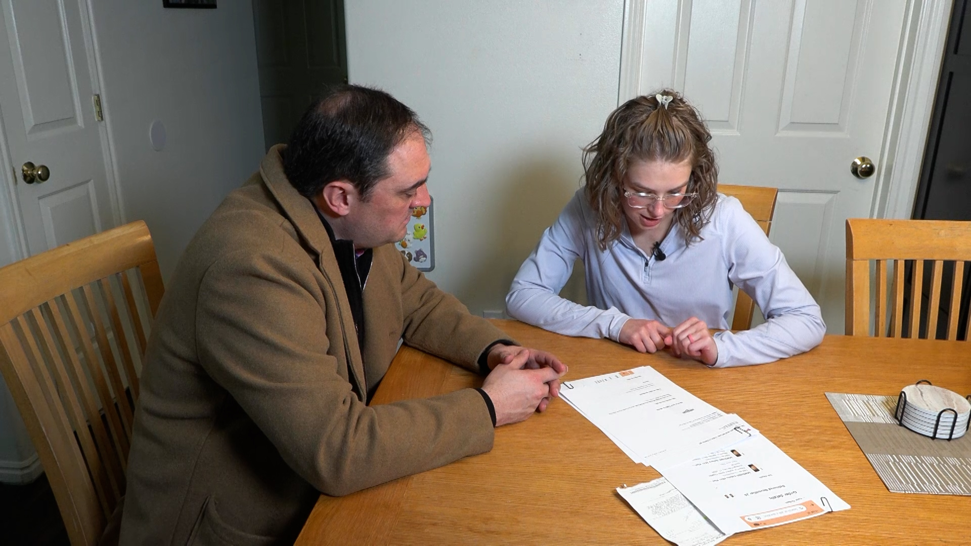 Erica Bikman shows KSL's Matt Gephardt the tracking that confirms her trade-ins vanished after she dropped them off with the shipper.