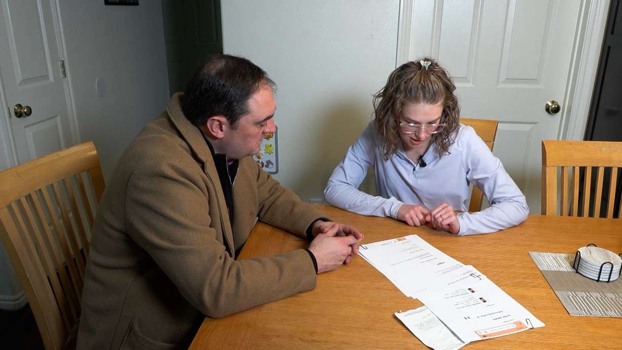 Erica Bikman shows KSL's Matt Gephardt the tracking that confirms her trade-ins vanished after she dropped them off with the shipper.