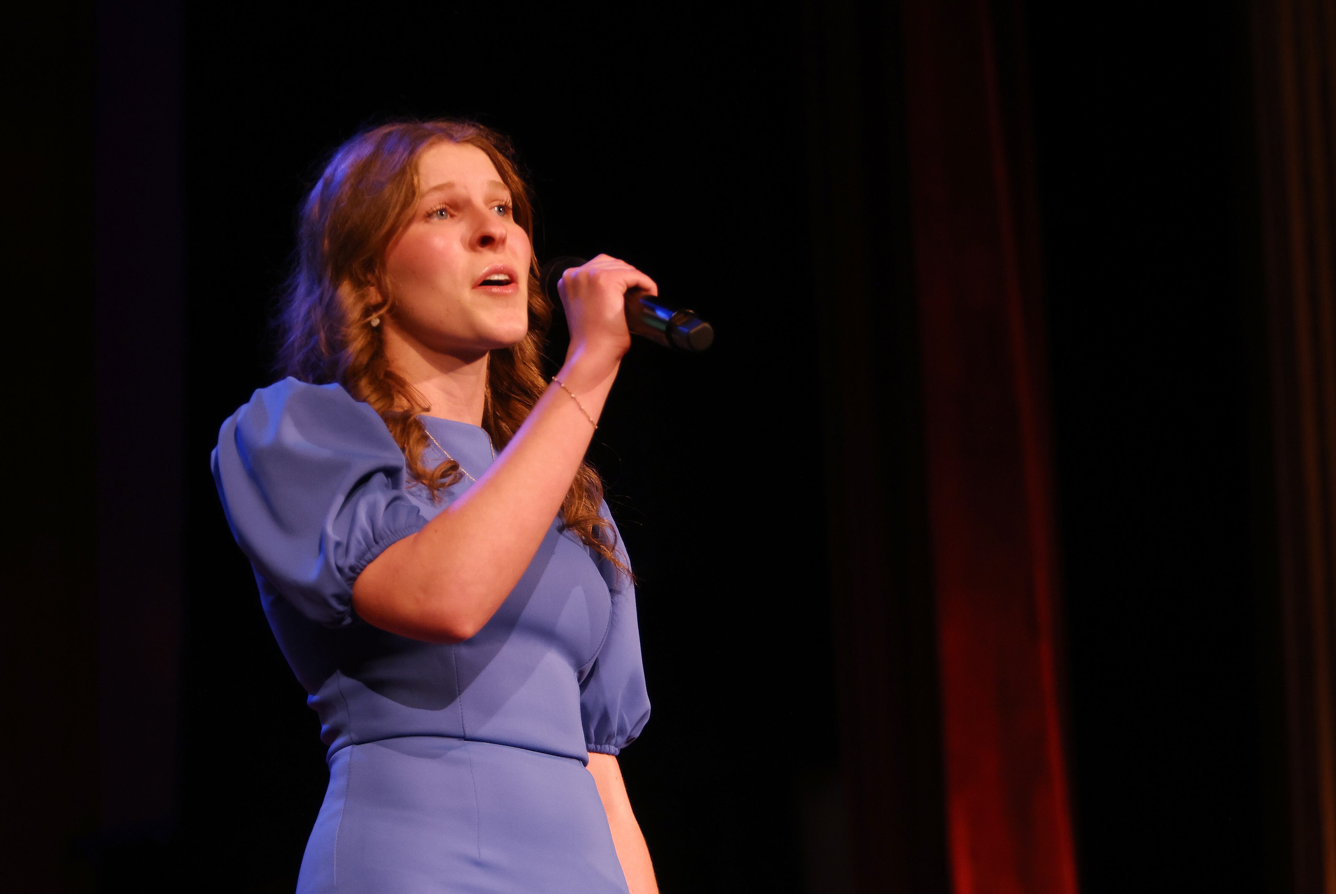 Elise Farmer, the vocal performance Sterling Scholar winner from 2025, performs “Somewhere Over the Rainbow” during the Sterling Scholar Awards presentation at the Bountiful Regional Center in Bountiful, Thursday.
