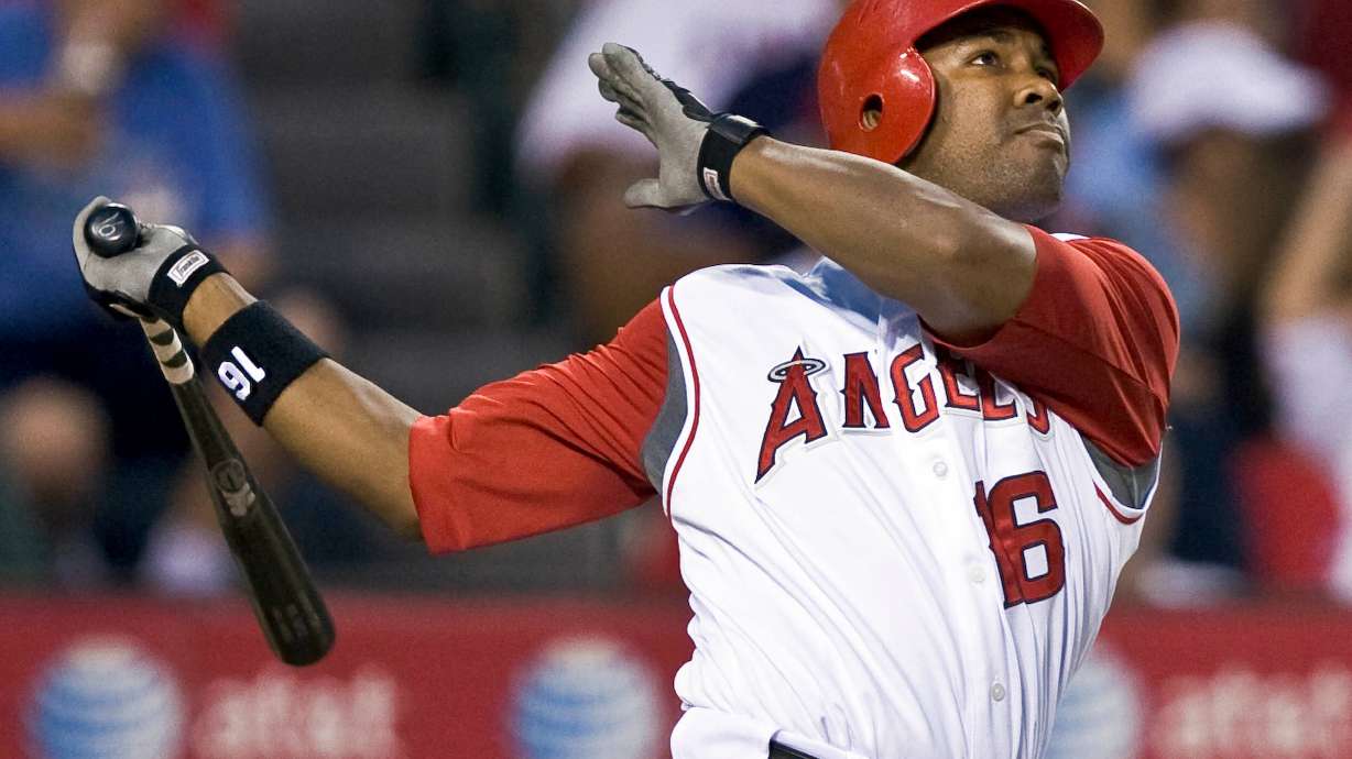 FILE - Los Angeles Angels' Garret Anderson watches the ball after hitting a two-run homer against the Toronto Blue Jays in the seventh inning of a baseball game in Anaheim, Calif., Friday, July 4, 2008.