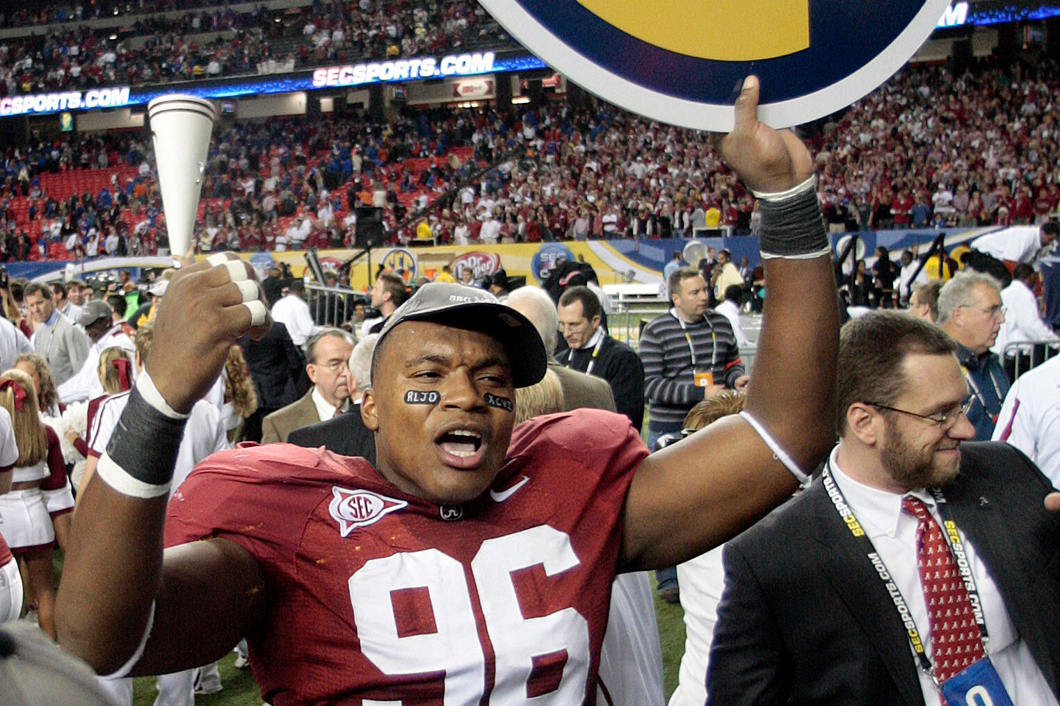 FILE - Alabama's Luther Davis (96) reacts after their 32-13 win over Florida in the SEC championship NCAA college football game at the Georgia Dome in Atlanta Saturday, Dec. 5, 2009. 