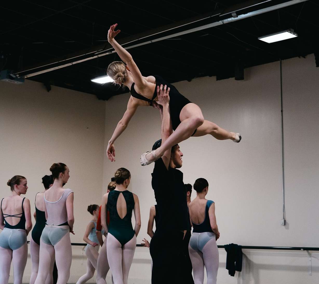 Jesyca Chugg is lifted by Enzo de Oliveira Castilho during a Utah Metropolitan Ballet rehearsal of Vanessa Cook's "A Brief Collection of Moments."