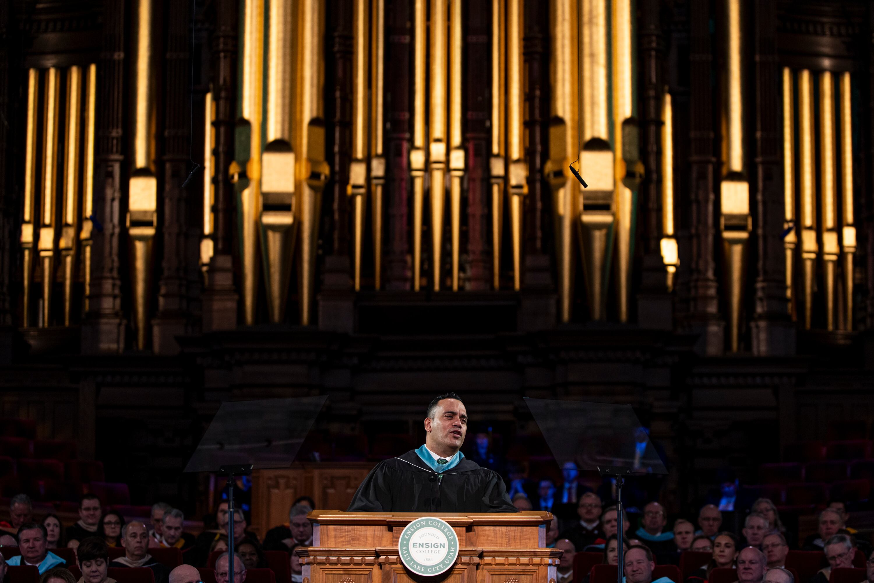 Brother Gabriel W. Reid, second counselor in the Sunday School General Presidency of The Church of Jesus Christ of Latter-day Saints, speaks to graduates during the 139th Ensign College commencement exercises at the Salt Lake Tabernacle on Temple Square in Salt Lake City on Friday. Reid spoke to graduates about "staying in the game."