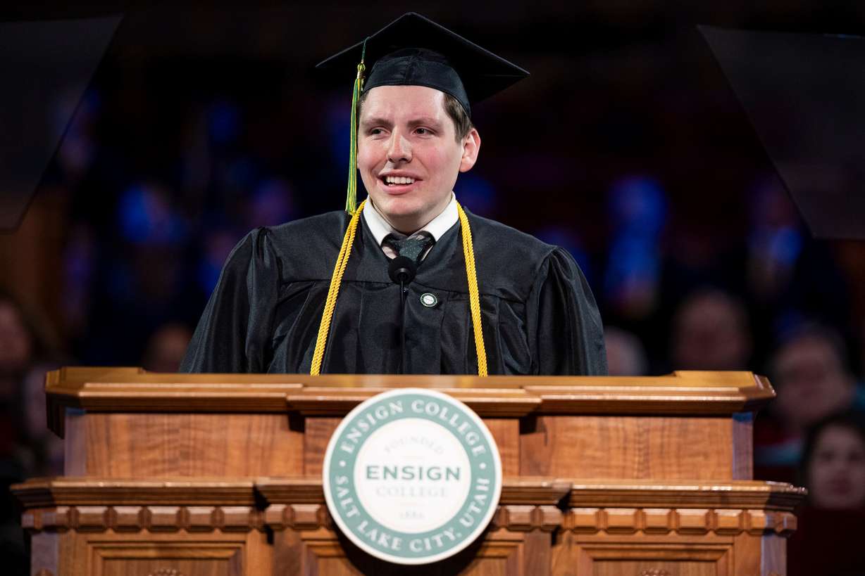 Cameron Kohutek, a Bachelor of Applied Science graduate in accounting, from Farmington, Utah, speaks during the 139th Ensign College commencement exercises at the Salt Lake Tabernacle on Temple Square in Salt Lake City on Friday. Kohutek said to graduates that they are living witnesses of the unifying power of the gospel of Jesus Christ.