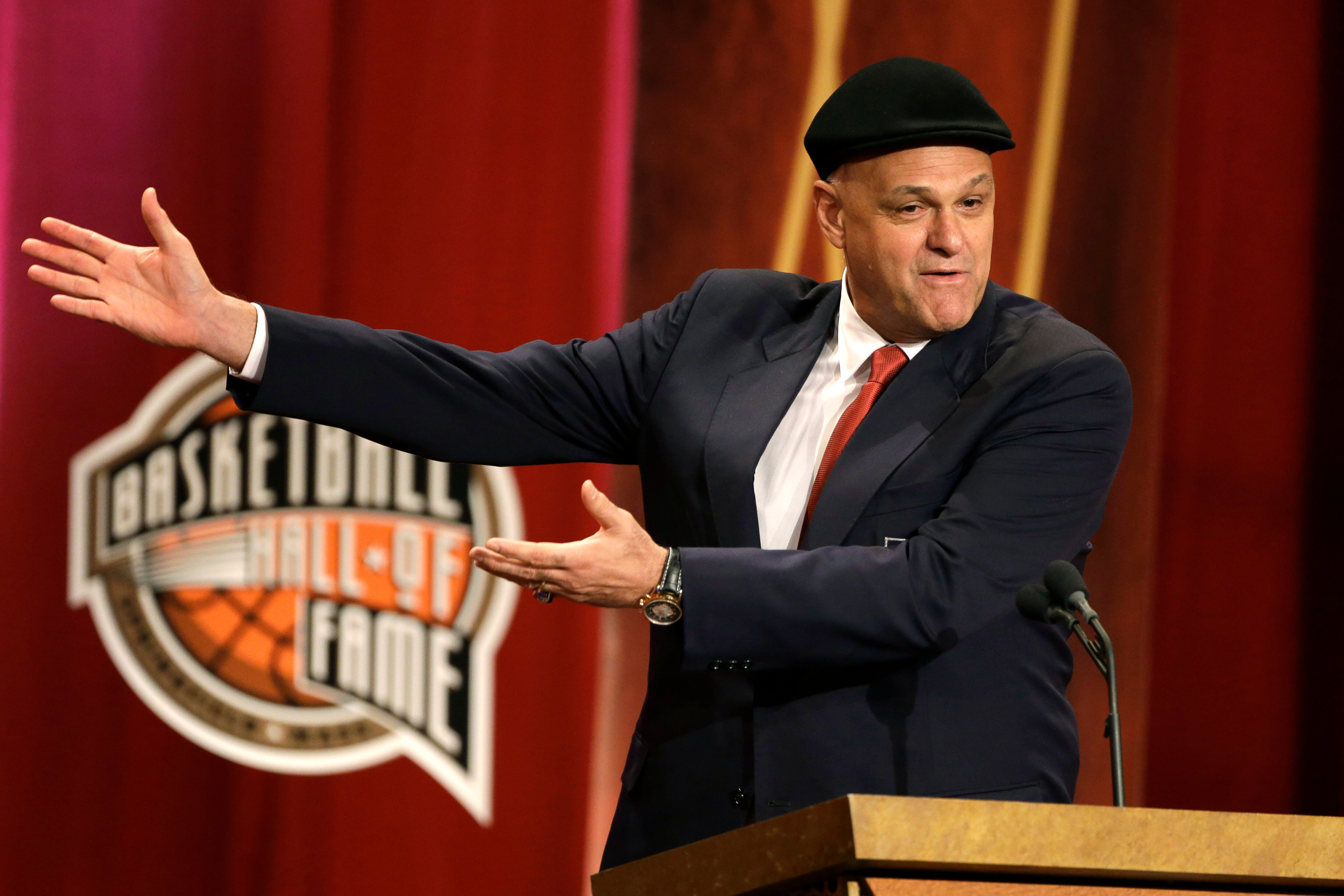 FILE - Inductee Oscar Schmidt, of Brazil, speaks during the enshrinement ceremony for this year's class of the Basketball Hall of Fame, at Symphony Hall in Springfield, Mass., Sept. 8, 2013. Schmidt, whom his Brazil compatriots know as the “Holy Hand,” died. Friday, April 17, 2026. He was 68. 