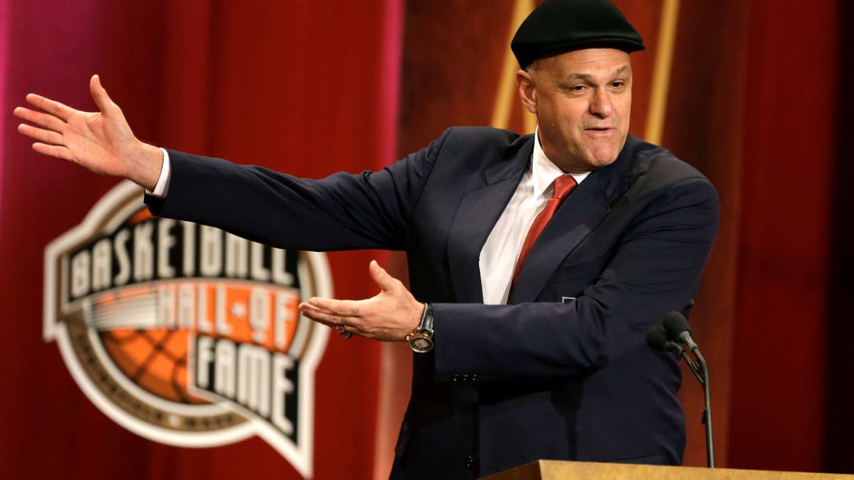 FILE - Inductee Oscar Schmidt, of Brazil, speaks during the enshrinement ceremony for this year's class of the Basketball Hall of Fame, at Symphony Hall in Springfield, Mass., Sept. 8, 2013. Schmidt, whom his Brazil compatriots know as the “Holy Hand,” died. Friday, April 17, 2026. He was 68.