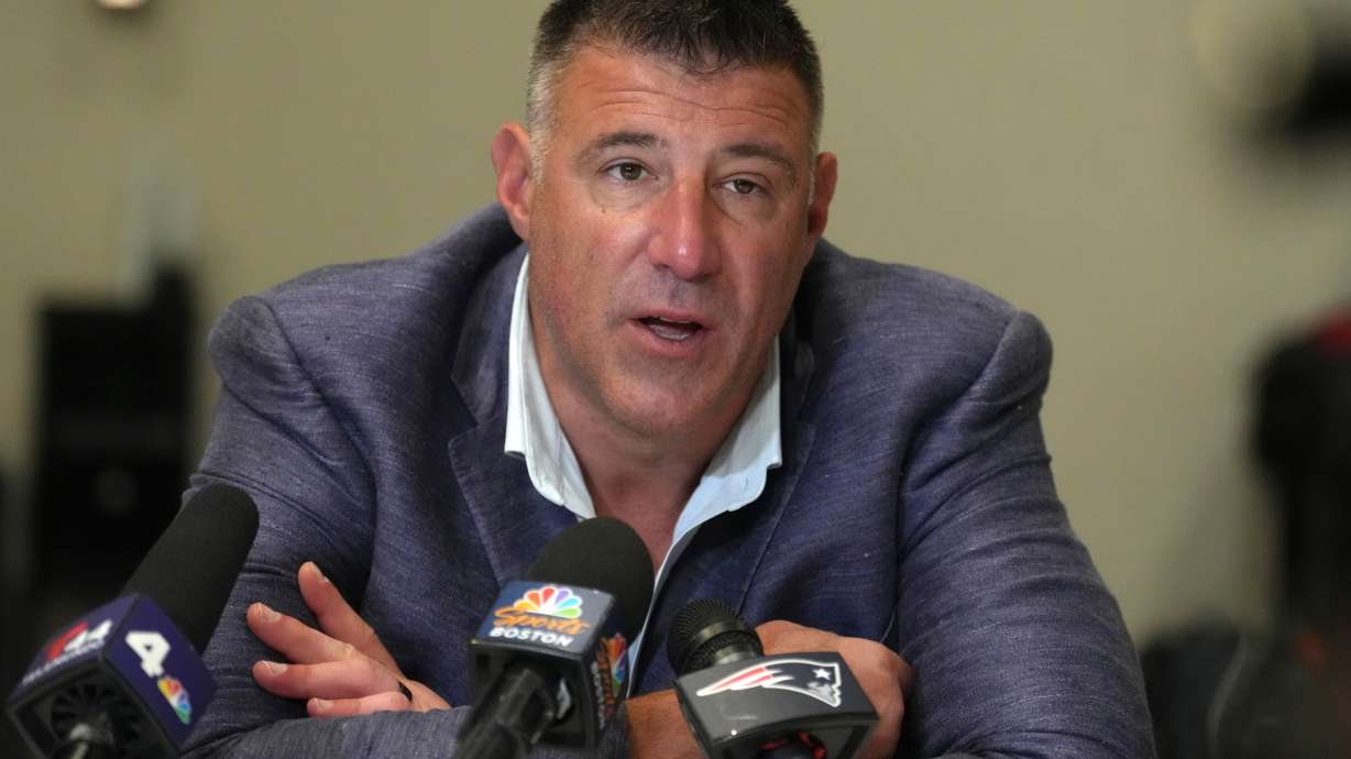New England Patriots head coach Mike Vrabel speaks to reporters at the NFL football annual meetings, Tuesday, March 31, 2026, in Phoenix.