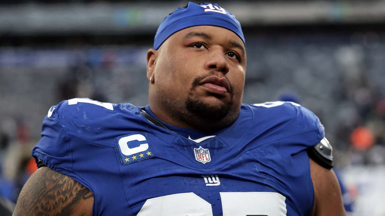FILE - New York Giants defensive tackle Dexter Lawrence II (97) walks off the field after an NFL football game against the Dallas Cowboys, Sunday, Jan. 4, 2026, in East Rutherford, N.J.