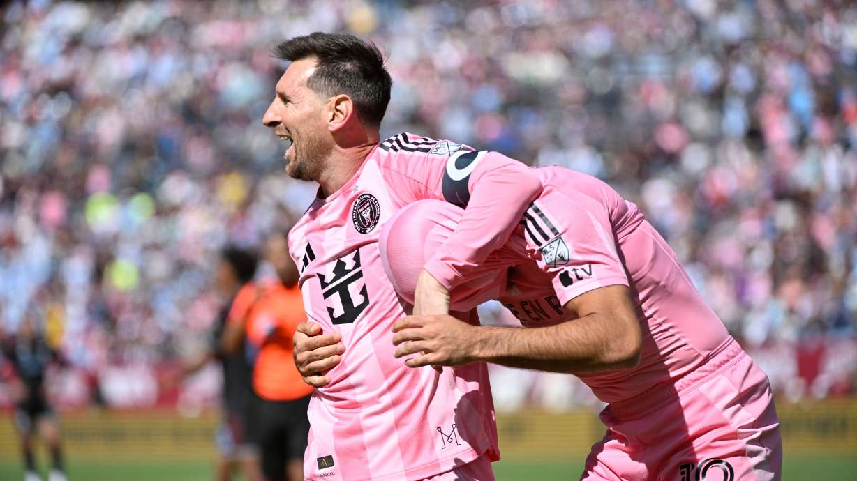 Inter Miami CF forwards Lionel Messi and Germán Berterame celebrate after a goal by Berterame in the first half of an MLS soccer game against the Colorado Rapids Saturday, April 18, 2026, in Denver.