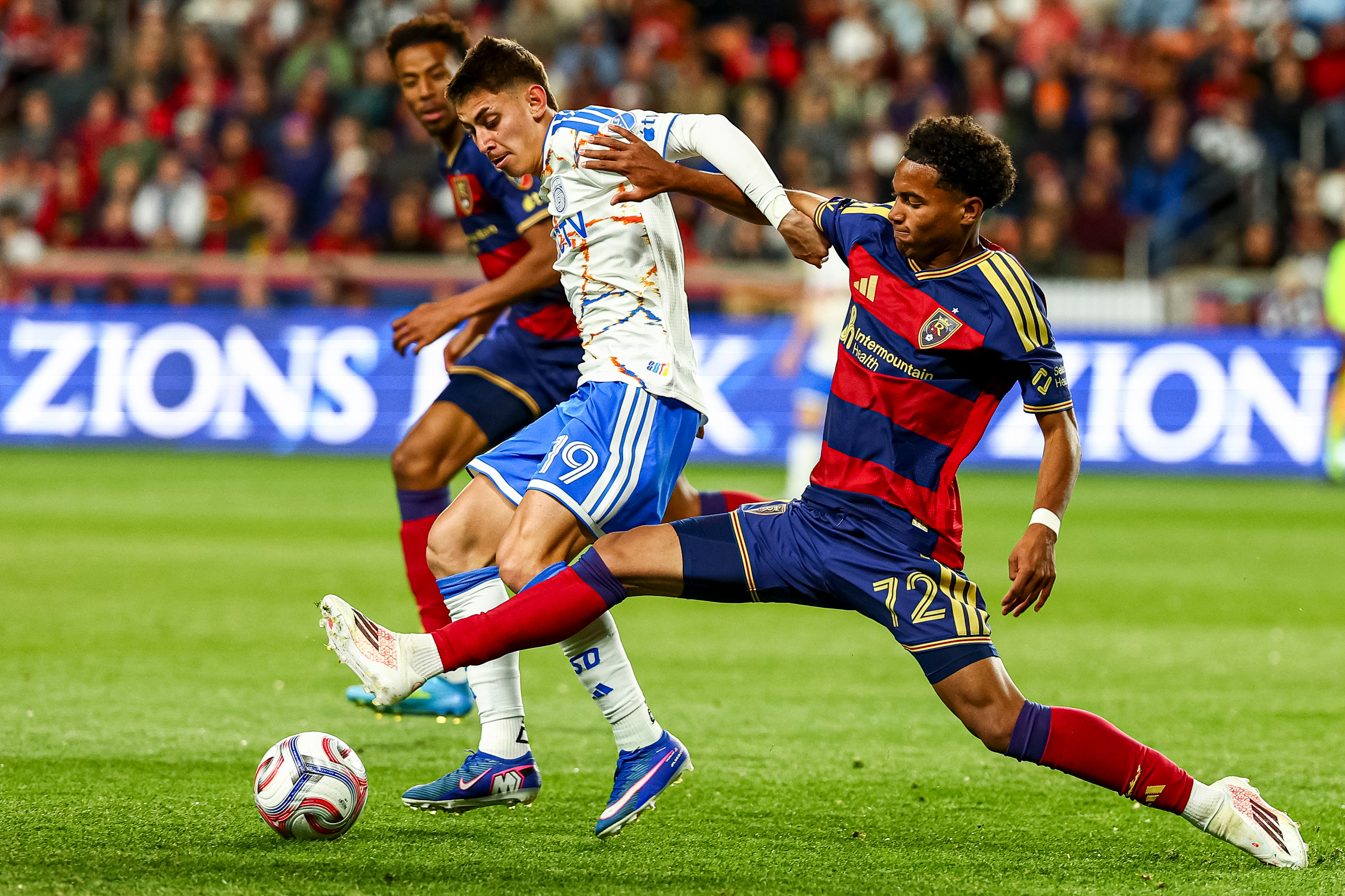 Real Salt Lake midfielder Zavier Gozo (72) steals the ball from San Diego FC midfielder David Vazquez (19) during the second half of a Major League Soccer game at America First Field in Sandy on Saturday, April 18, 2026.