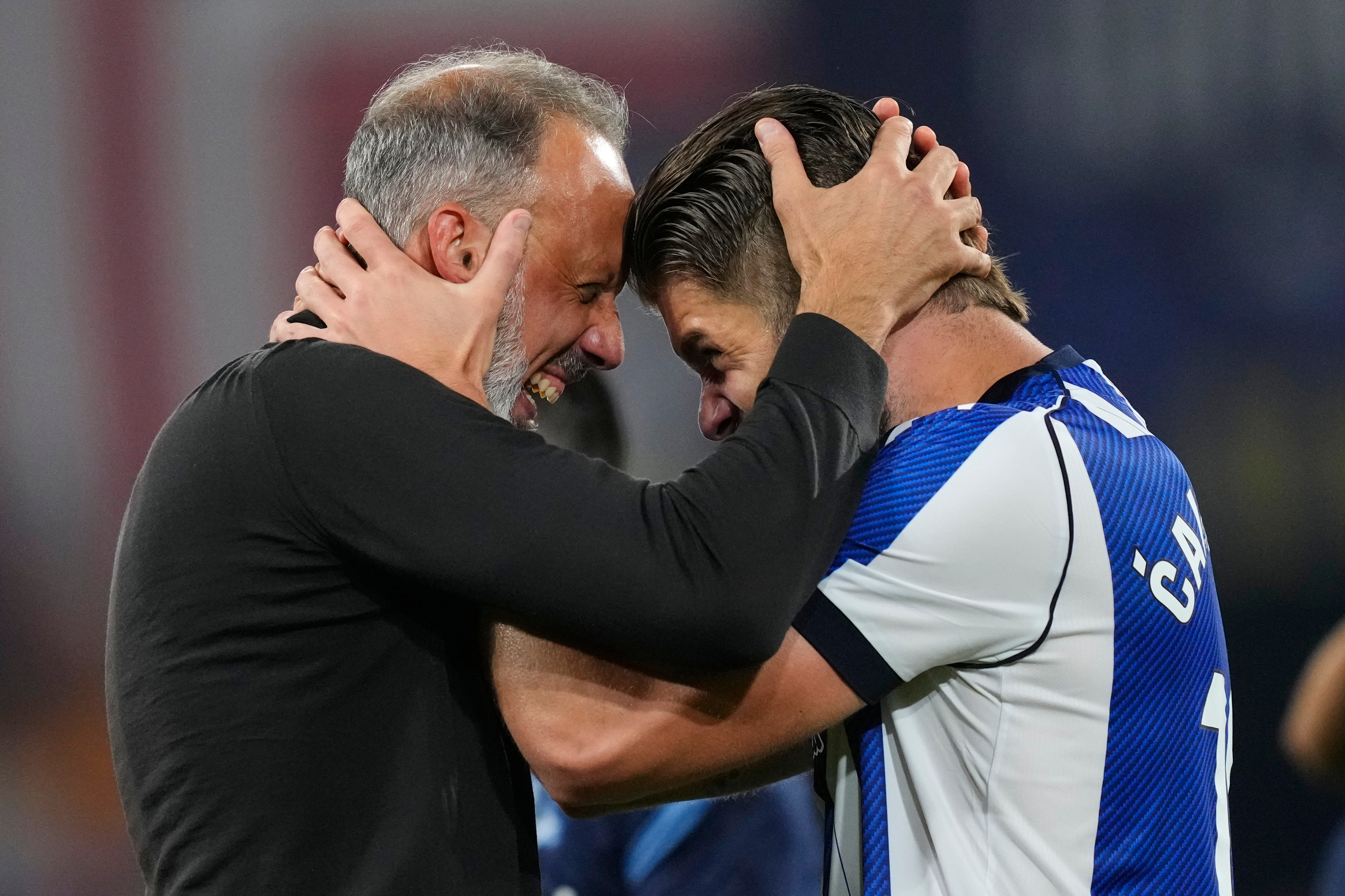Real Sociedad's head coach Pellegrino Matarazzo, right, celebrates with Duje Caleta-Car after winning the Copa del Rey final soccer match between Atletico Madrid and Real Sociedad in Seville, Spain, Saturday, April. 18, 2026. 