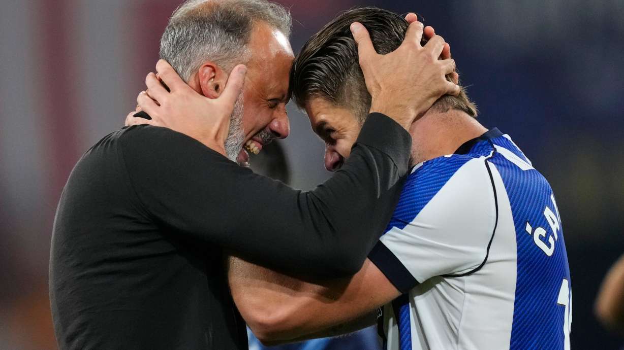 Real Sociedad's head coach Pellegrino Matarazzo, right, celebrates with Duje Caleta-Car after winning the Copa del Rey final soccer match between Atletico Madrid and Real Sociedad in Seville, Spain, Saturday, April. 18, 2026.