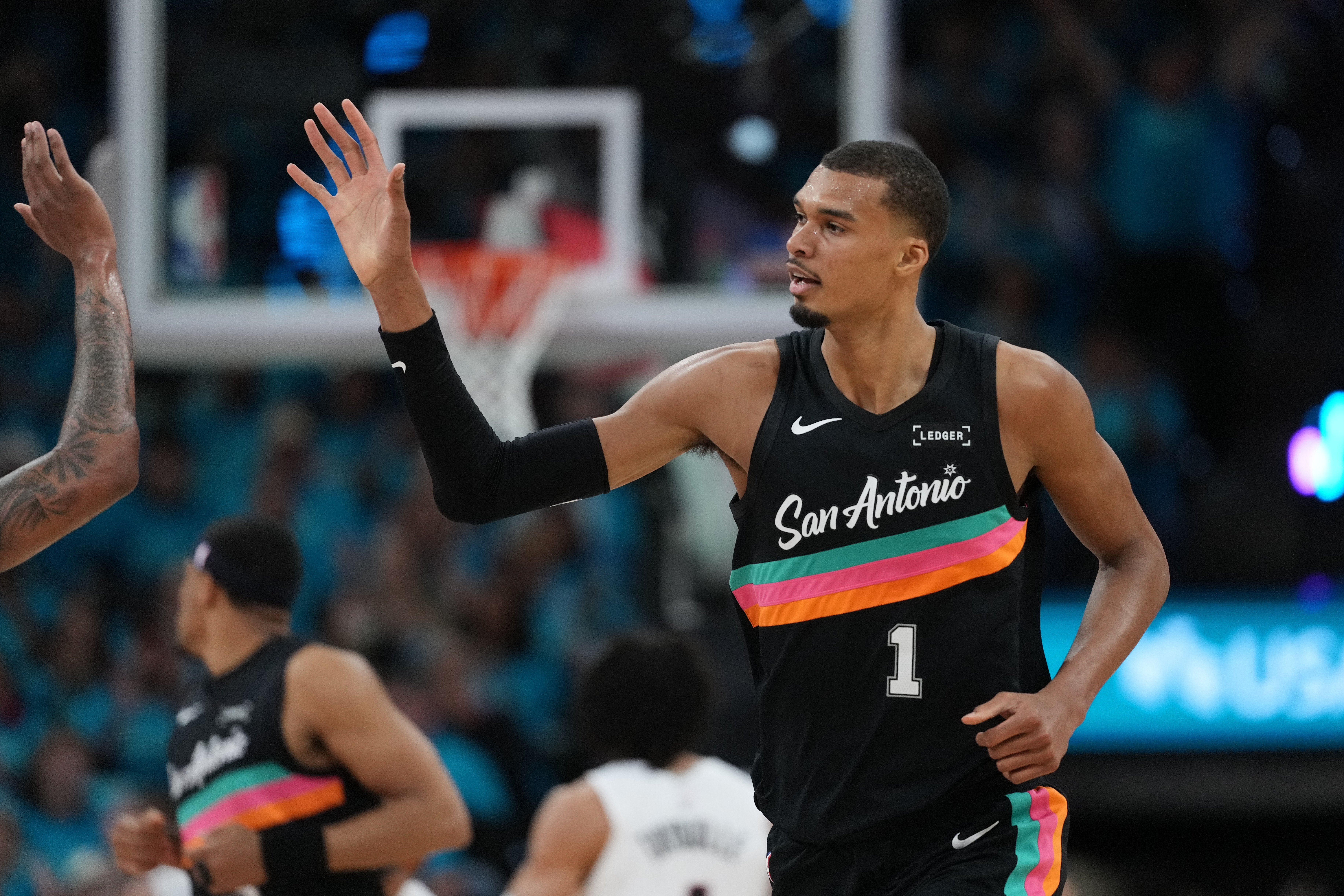 Wembanyama scores 35 points in playoff debut as Spurs roll past Trail Blazers 111-98