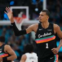 Wembanyama scores 35 points in playoff debut as Spurs roll past Trail Blazers 111-98
