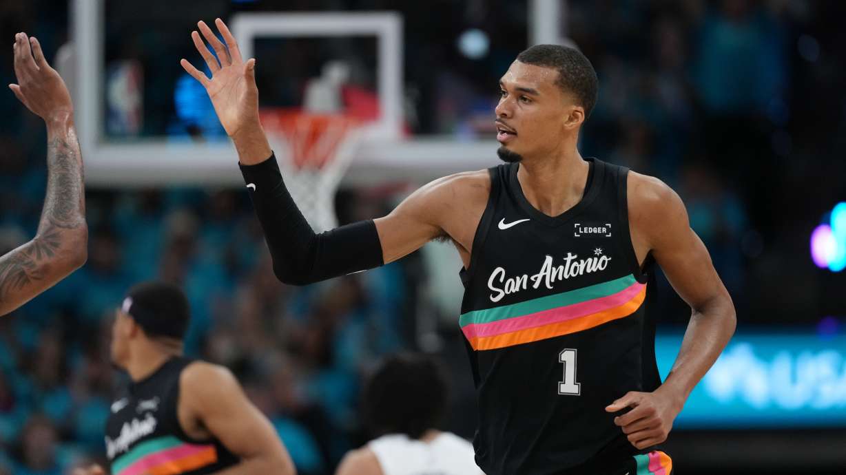 San Antonio Spurs forward Victor Wembanyama (1) celebrates a play against the Portland Trail Blazers during the first half in Game 1 of a first-round NBA playoffs basketball series in San Antonio, Sunday, April 19, 2026.
