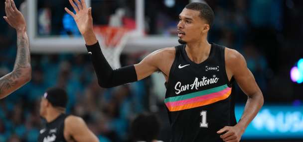 Wembanyama scores 35 points in playoff debut as Spurs roll past Trail Blazers 111-98