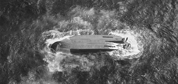 6 crew still missing after overturned ship that disappeared after typhoon is found near Saipan