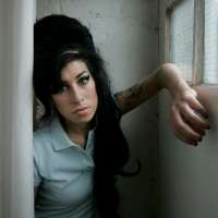 Amy Winehouse's father loses legal bid for funds friends made selling singer's memorabilia