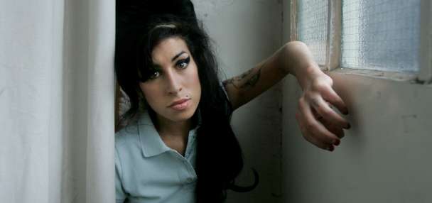 Amy Winehouse's father loses legal bid for funds friends made selling singer's memorabilia
