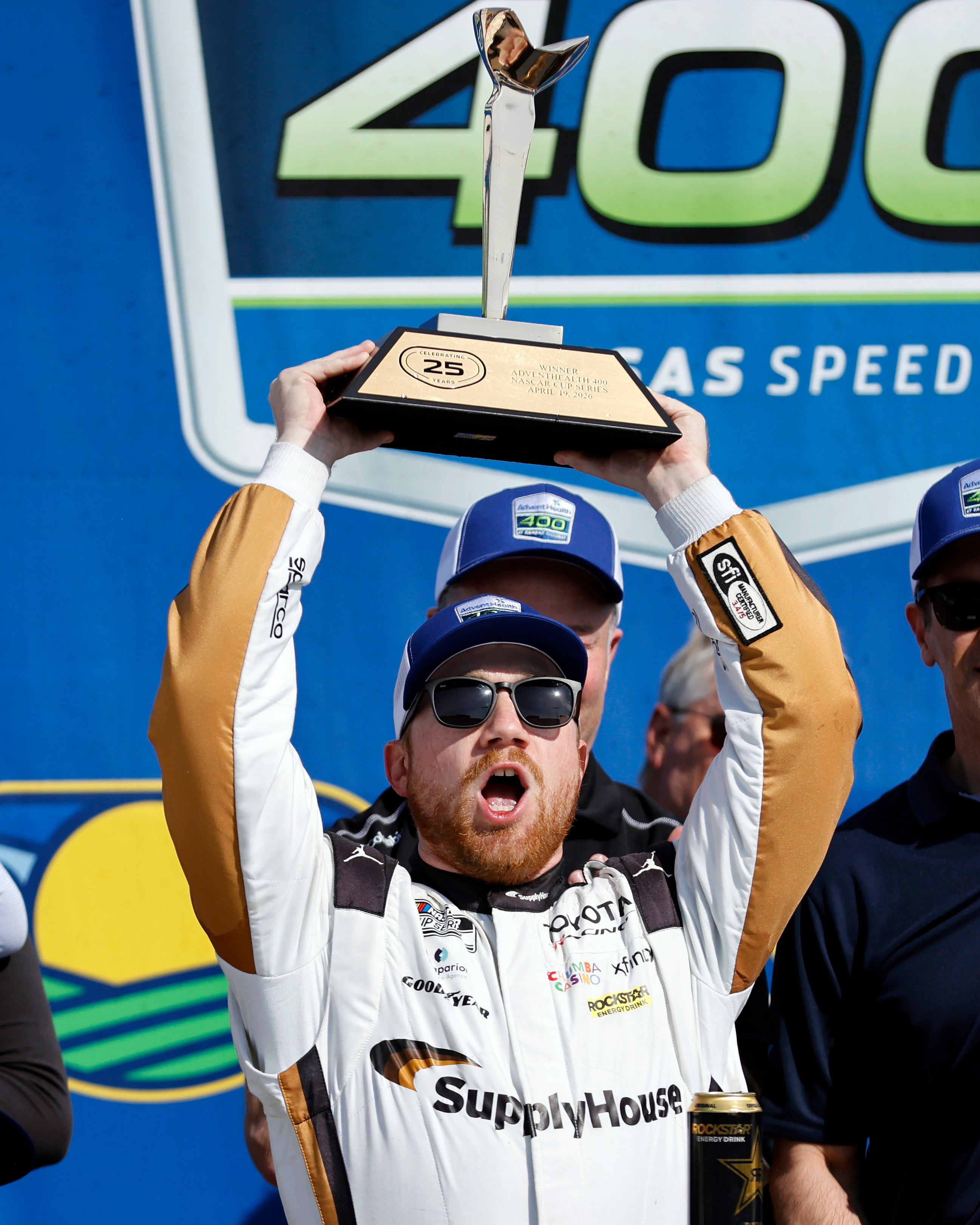 Tyler Reddick celebrates in Victory Lane after winning a NASCAR Cup Series auto race at Kansas Speedway in Kansas City, Kan., Sunday, April 19, 2026. 