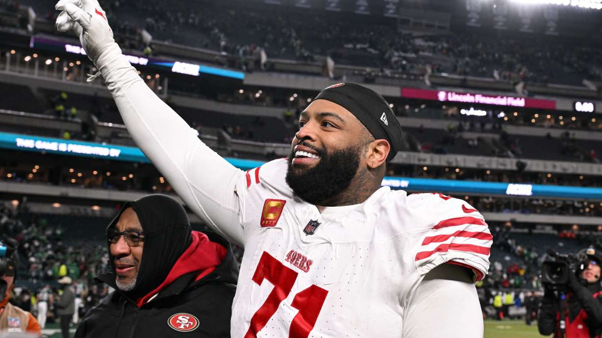 FILE - San Francisco 49ers offensive tackle Trent Williams (71) celebrates as he walks off the field after an NFL wild card playoff football game against the Philadelphia Eagles, Jan. 11, 2026, in Philadelphia.