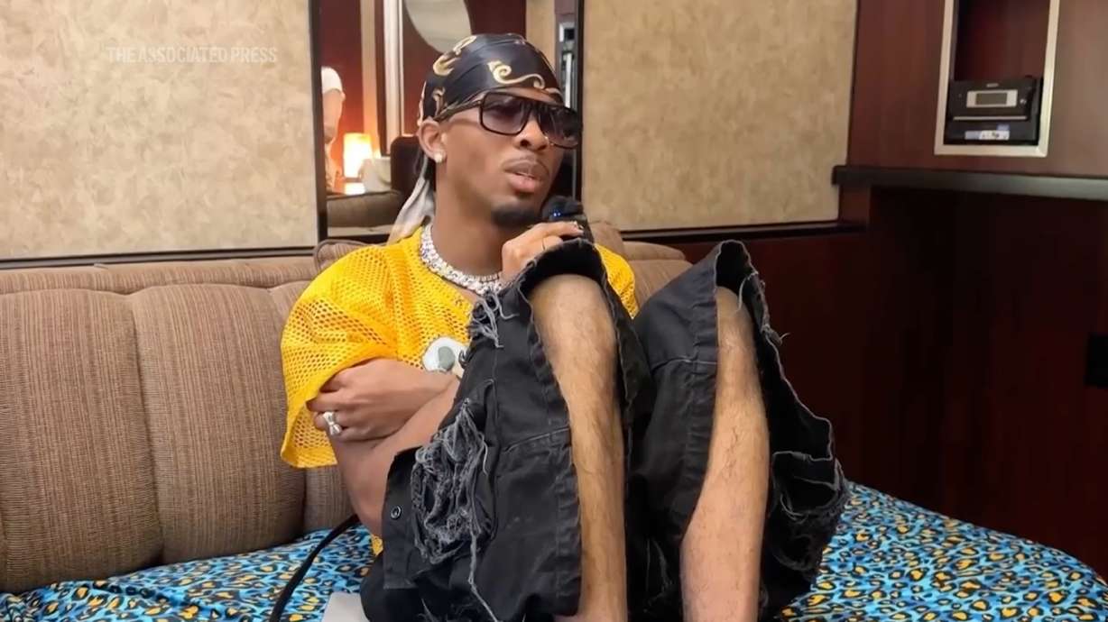 Singer-songwriter, David Burke, aka D4vd, sits in artist space at Coachella music festival on April 18, 2025, in Indio, Calif. The singer was charged with murder after the body of a 14-year-old girl was found in his car.