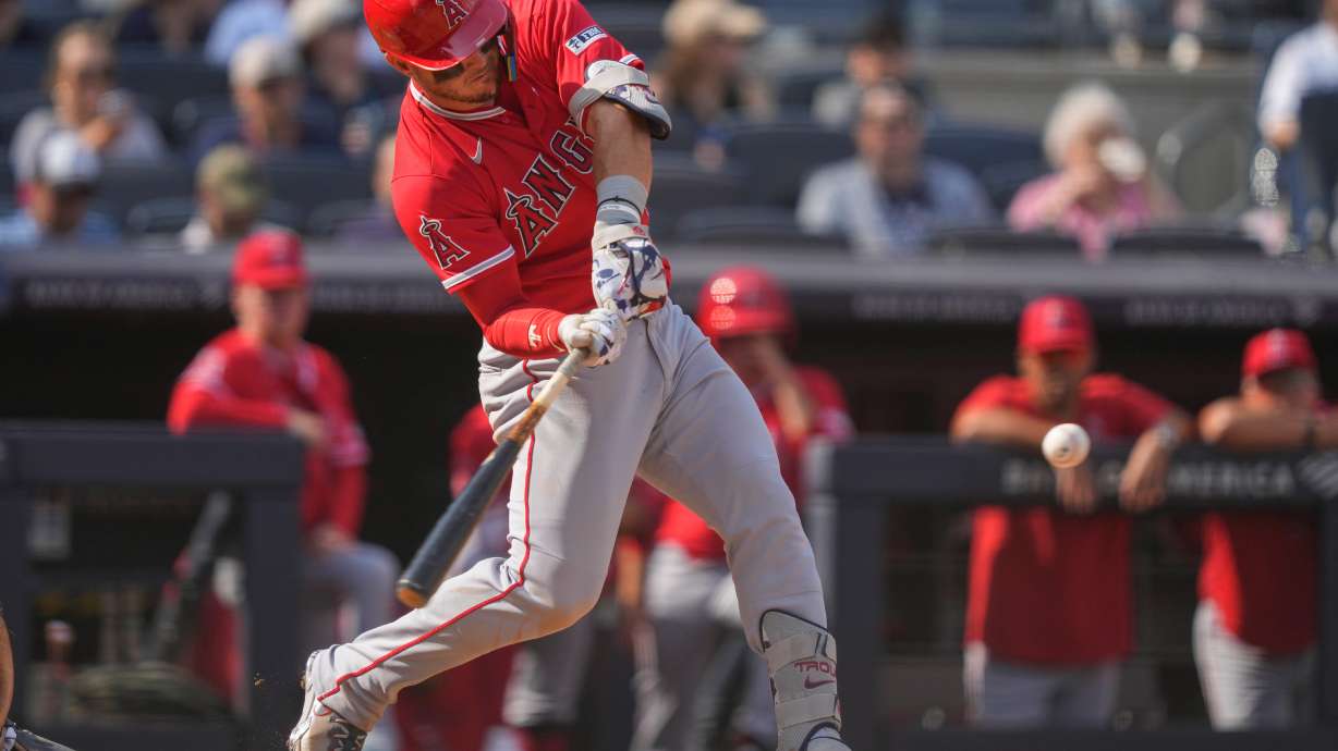 Los Angeles Angels' Mike Trout (27) hits a home run during the seventh inning of a baseball game against the New York Yankees, Thursday, April 16, 2026, in New York.