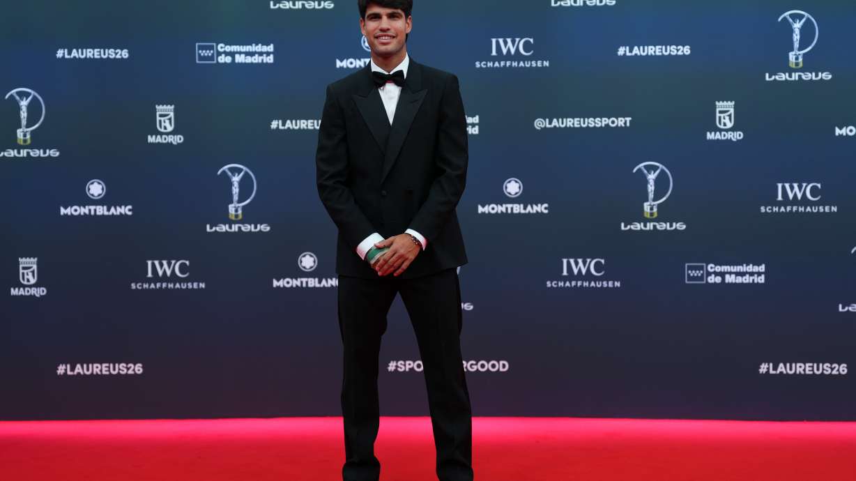 Tennis player Carlos Alcaraz poses as he arrives for the 2026 Laureus World Sports Awards ceremony in Madrid, Spain, Monday, April 20, 2026.