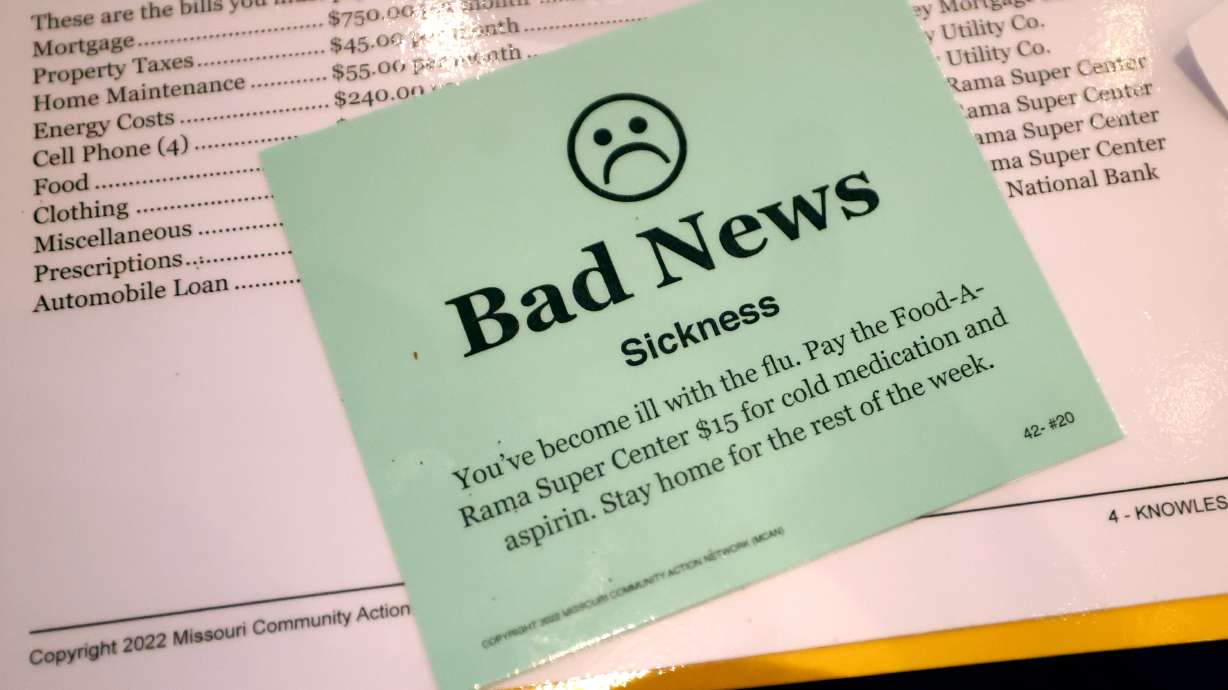 A "Bad News" card in a poverty simulation at the Know Poverty Summit at Provo City Library. The Wednesday event sparked dialogue among community members and leaders about the realities people face living in poverty.