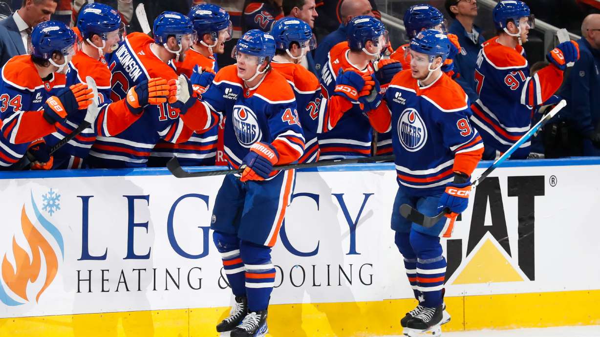 Edmonton Oilers' Kasperi Kapanen (42) celebrates the game-winning goal against the Anaheim Ducks during the third period of an NHL playoff game in Edmonton on Monday, April 20, 2026.