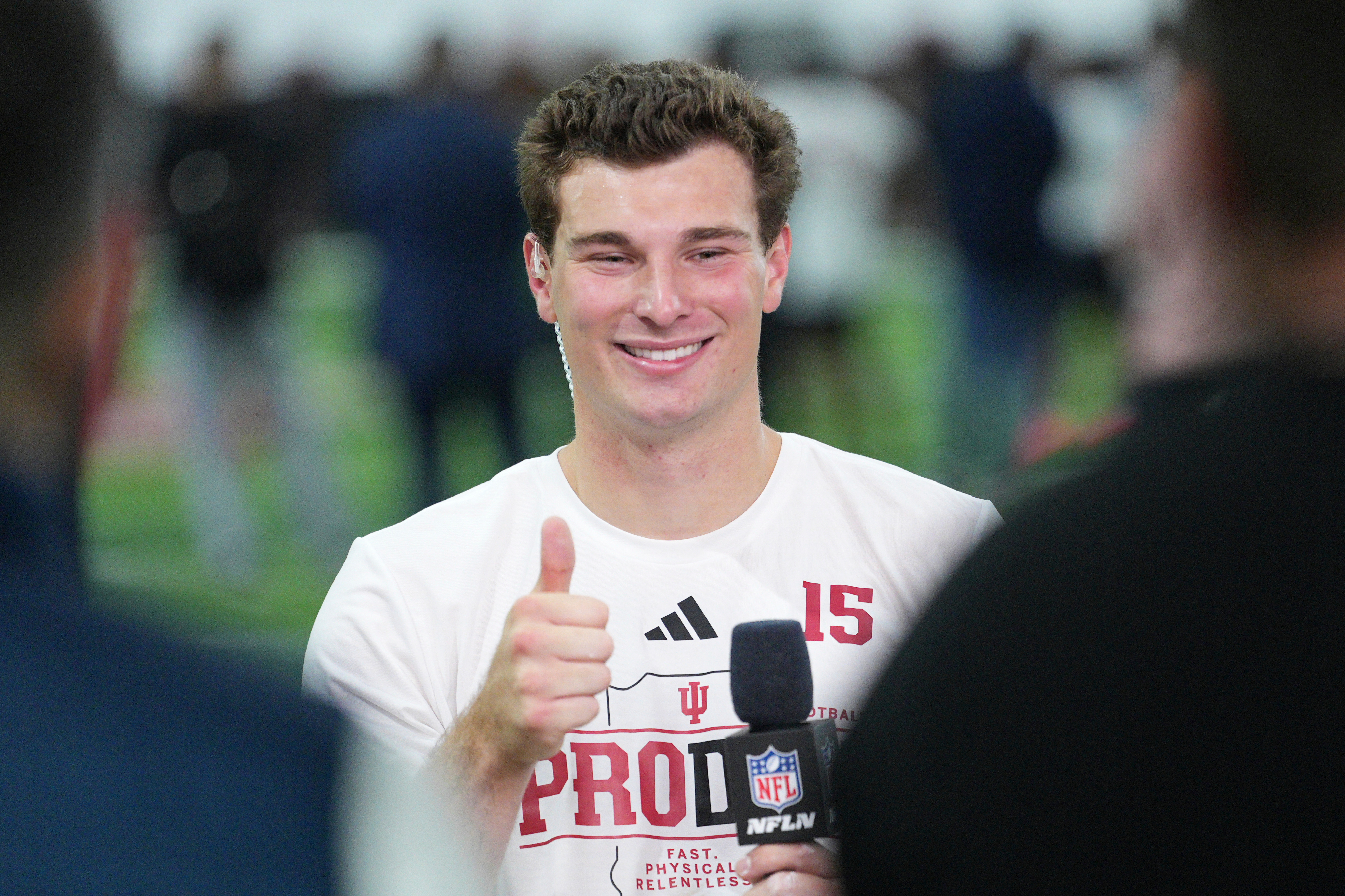 Indiana quarterback Fernando Mendoza gives a thumbs up after an interview with NFL Network at the school's NFL football pro day Wednesday, April 1, 2026, in Bloomington, Ind. 