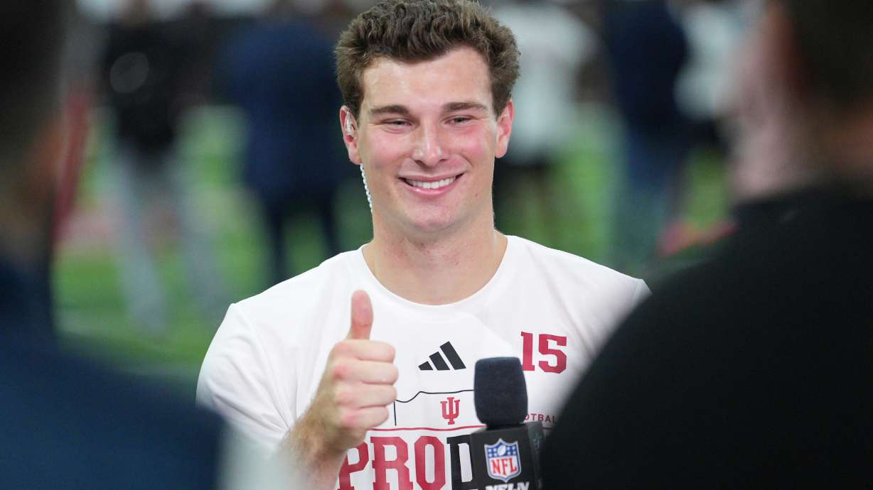 Indiana quarterback Fernando Mendoza gives a thumbs up after an interview with NFL Network at the school's NFL football pro day Wednesday, April 1, 2026, in Bloomington, Ind.
