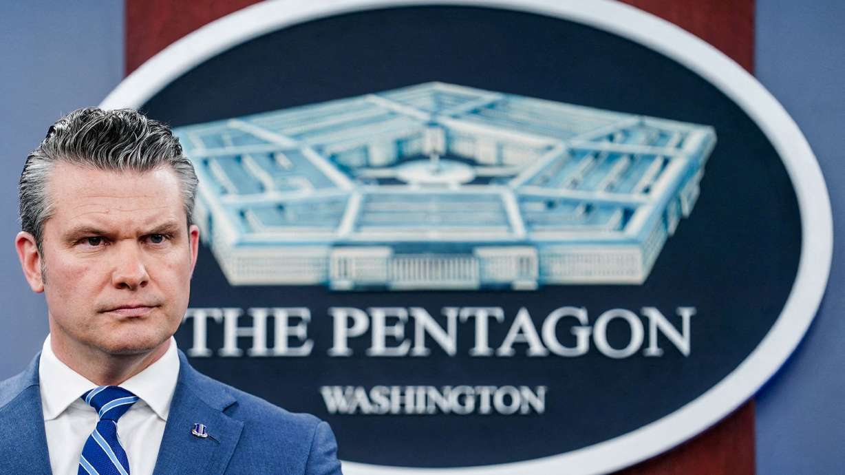Secretary of Defense Pete Hegseth looks on during a briefing at the Pentagon on Thursday. Hegseth announced Tuesday that the military will no longer require the annual flu vaccine for troops.