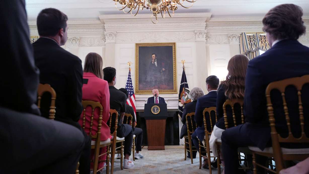 President Donald Trump speaks during an event for NCAA national champions in the State Dining Room of the White House, Tuesday, April 21, 2026, in Washington.