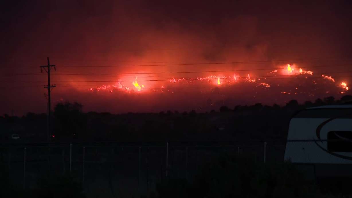 A fire sparked Tuesday just south of Goshen. Officials say it's burned more than 100 acres and has prompted evacuations of a few homes near the fire.