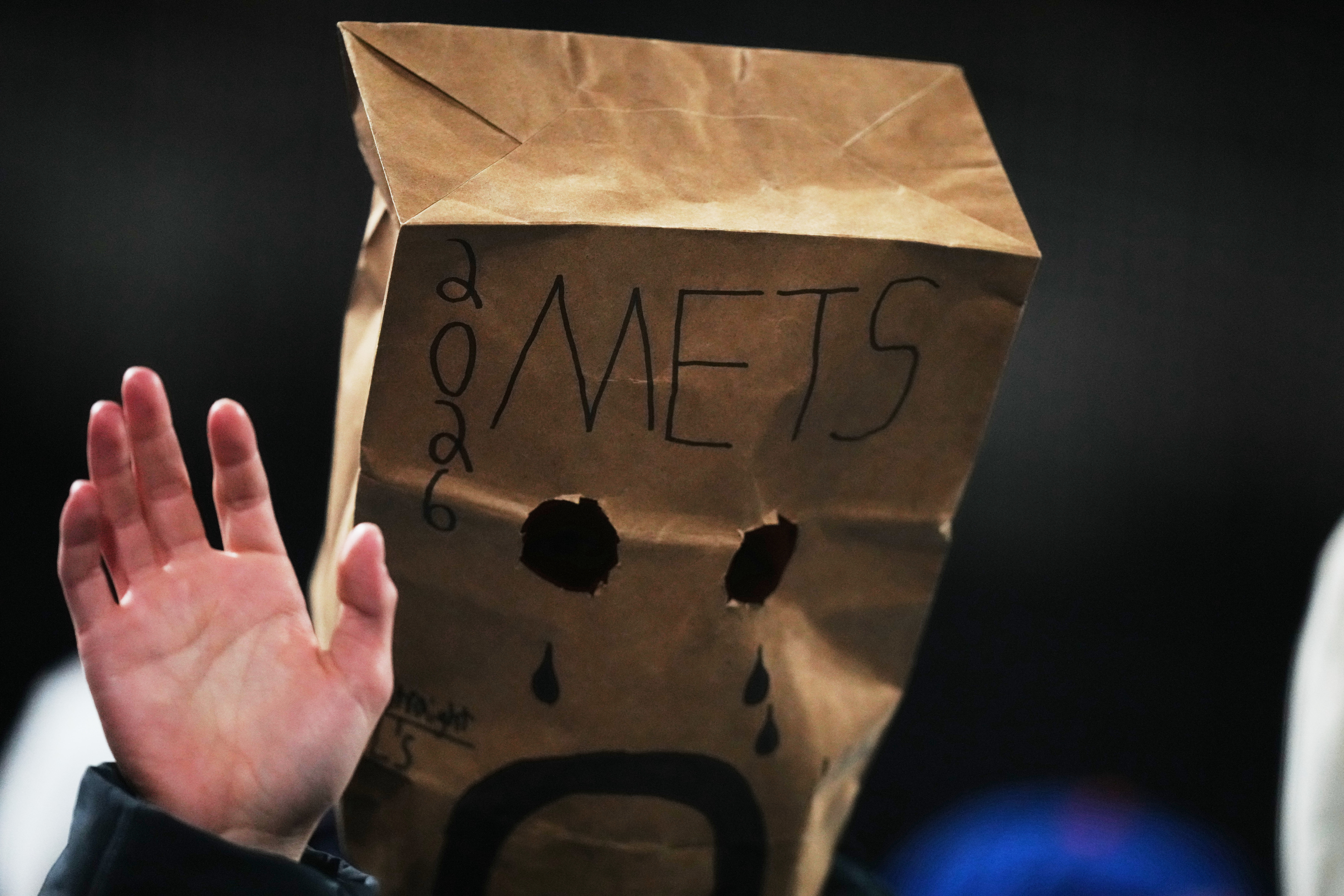 Mets fans mostly stay home but fill Citi Field with late boos as New York's skid hits 12 games