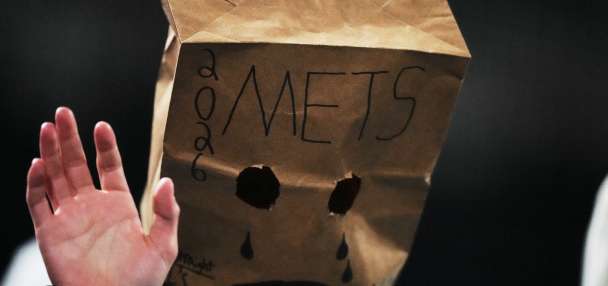 Mets fans mostly stay home but fill Citi Field with late boos as New York's skid hits 12 games