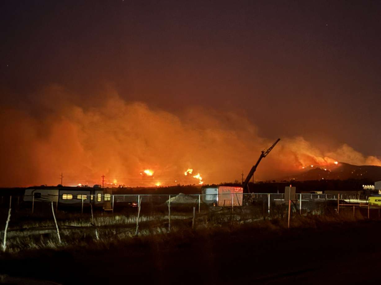 A fire sparked Tuesday just south of Goshen. Officials say it's burned more than 100 acres and has prompted evacuations of a few homes near the fire.