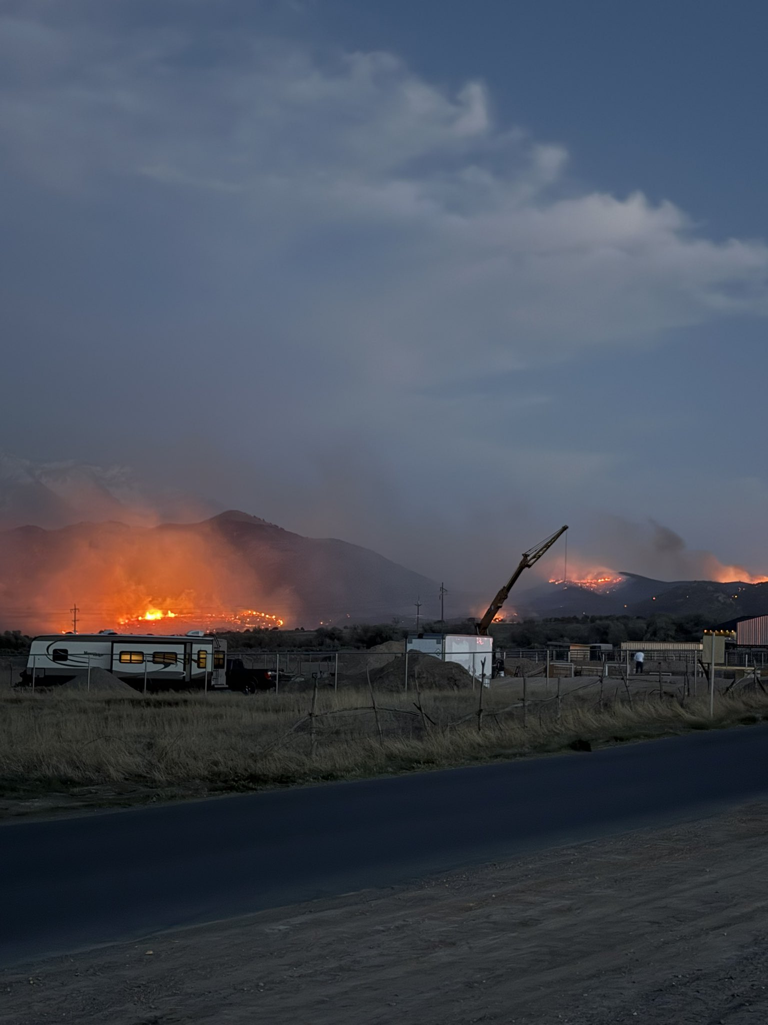 A fire sparked Tuesday just south of Goshen. Officials say it's burned more than 100 acres and has prompted evacuations of a few homes near the fire.