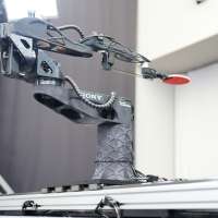 A robot is beating human pros at table tennis. Its maker calls it a milestone for machines