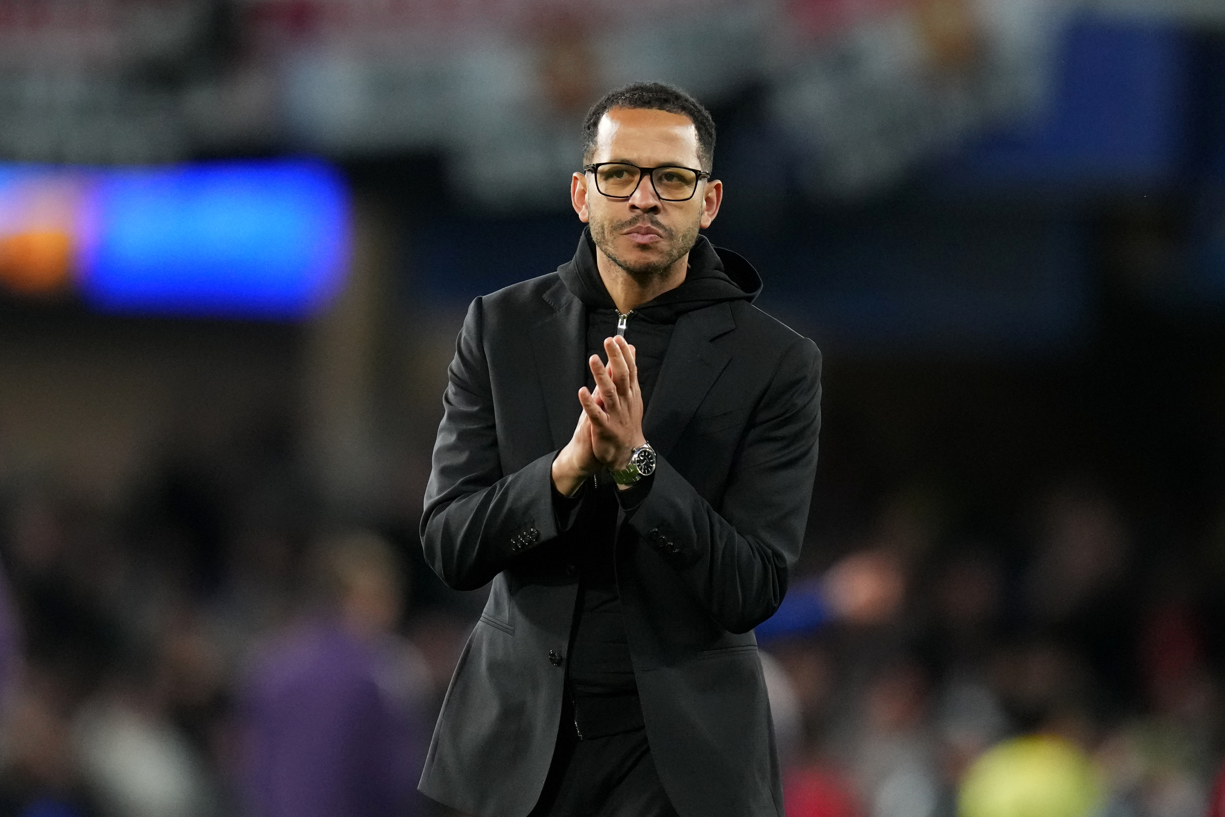 Chelsea's head coach Liam Rosenior leaves the field after the English Premier League soccer match between Chelsea and Manchester United in London, Saturday, April 18, 2026. 