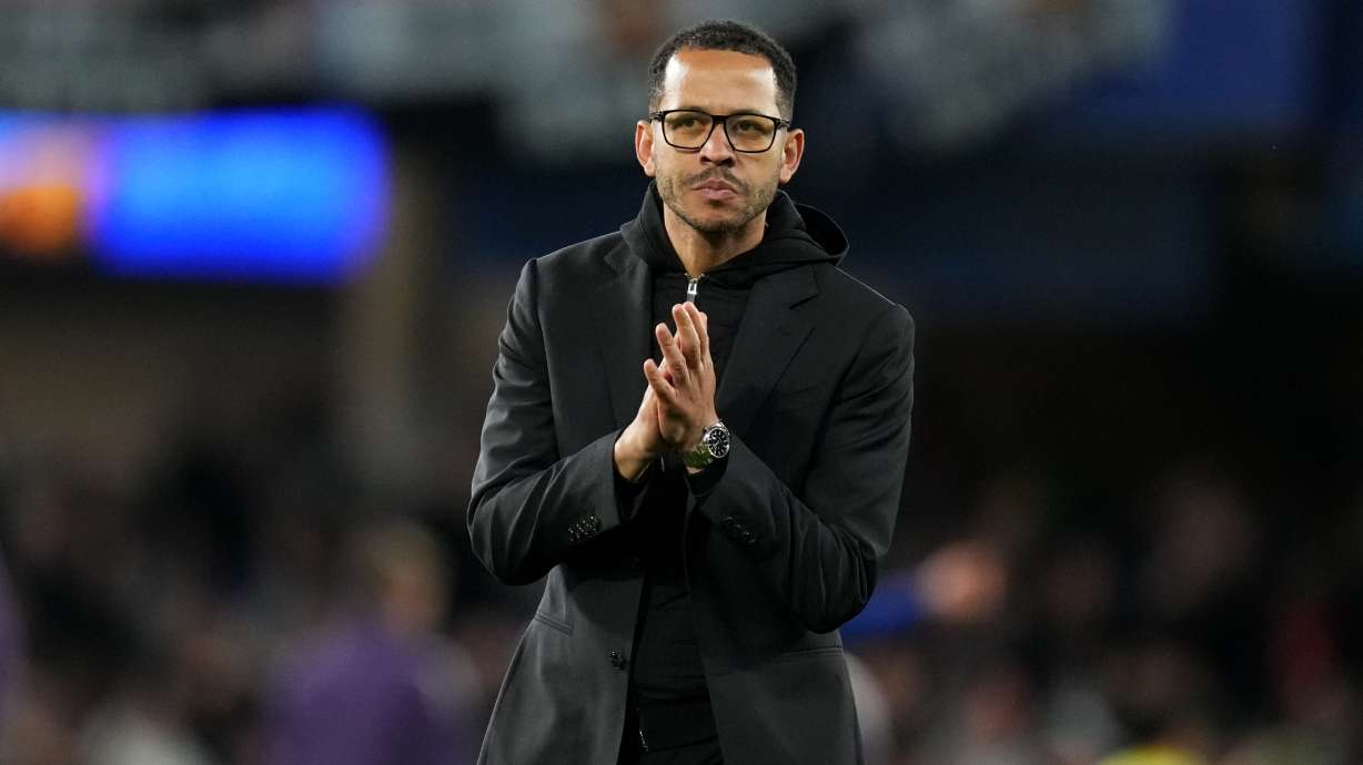 Chelsea's head coach Liam Rosenior leaves the field after the English Premier League soccer match between Chelsea and Manchester United in London, Saturday, April 18, 2026.